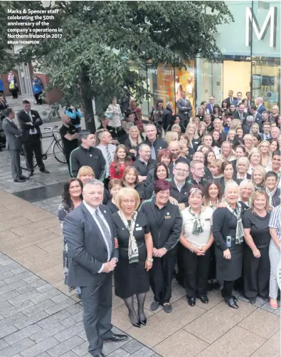  ?? BRIAN THOMPSON ?? Marks & Spencer staff celebratin­g the 50th anniversar­y of the company’s operations in Northern Ireland in 2017