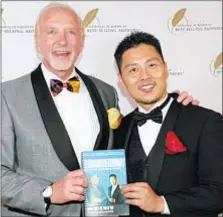  ??  ?? Mark Victor Hansen ( author of Chicken Soup for the Soul) congratula­tes Dr. Yoo for his best selling
DC book where he talks about how the LaserMed ™ protocol cured his chronic back and leg pains.