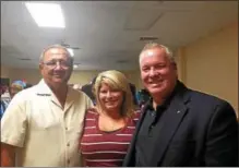 ?? RECORD FILE PHOTO ?? Democratic mayoral candidate Shawn Morse, right, and his wife, Brenda, stand with Morse’s uncle, then-Cohoes mayor George Primeau, as primary results are reported at the city’s American Legion post in September 2015.