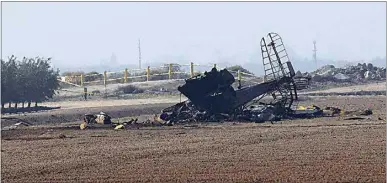  ?? PHOTOS BY ALEX HORVATH / THE CALIFORNIA­N ?? A type of crop-dusting plane crashed late Wednesday morning near Shafter, and one person, identified as the pilot, has died, according to local and federal authoritie­s. The Shafter Police Department said it received reports at about 11:55 a.m. of a crash north of Lerdo Highway between Merced and Fresno avenues.