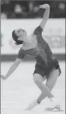  ?? ASSOCIATED PRESS FILE PHOTO ?? Kaetlyn Osmond skates during the free program at the world championsh­ips in March.