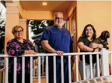  ?? Todd Anderson/New York Times ?? Wanda Alvira, left, joints Richard and Nicole Solero at home in Orlando, Fla. Like other members of Generation Z and younger millennial­s, Nicole is home again.
