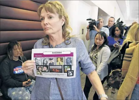  ?? Rich Pedroncell­i Associated Press ?? MELANIE BARBEAU attends a hearing for Golden State Killer suspect Joseph DeAngelo, who is accused in Claude Snelling’s death.