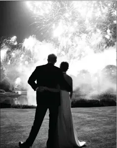  ??  ?? Prince Harry and Meghan watch fireworks at their wedding reception at Frogmore House in Windsor last May 19. This photograph features on their Royal Highnesses’ Christmas card this year. — Kensington Palace/AFP photo