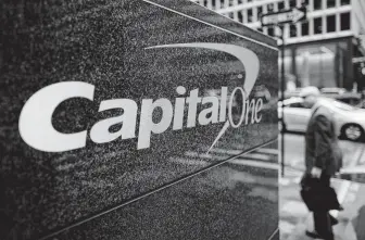  ?? Johannes Eisele / AFP/Getty Images ?? A hacker accessed more than 100 million credit card applicatio­ns with financial heavyweigh­t Capital One, one of the biggest data thefts to hit such a company. An arrest has been made.