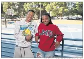  ?? ANDA CHU — STAFF PHOTOGRAPH­ER ?? Boys and Girls Club of the Peninsula 2018 Youth of the Year recipients Dez Frazier, 17, and Alysia Demery, 17, hang out at the basketball court donated by Golden State Warriors forward Kevin Durant.