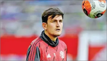  ?? AFP ?? A Greek court handed Harry Maguire a 21-month suspended sentence on assault and bribery charges.