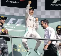  ?? PICTURE: EPA ?? Mercedes driver Nico Rosberg celebrates winning the Grand Prix of Belgium at the SpaFrancor­champs race track yesterday.