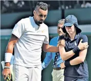  ??  ?? Marked: Nick Kyrgios consoles a tearful ball girl at Wimbledon. Below, Lleyton Hewitt, who left Claire with a bruise in 1998