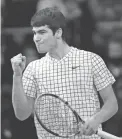  ?? ANTONIO CALANNI/AP ?? Spain’s Carlos Alcaraz celebrates a victory against Sebastian Baez in the ATP Next Gen semifinals on Nov. 12.