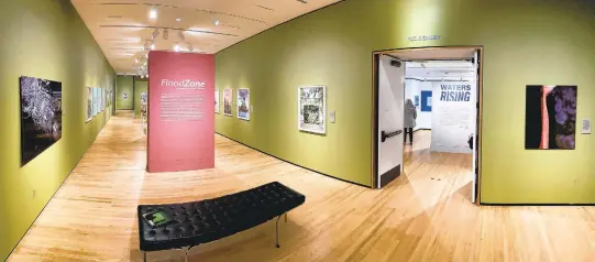  ?? STEPHEN M. KATZ/STAFF PHOTOS ?? “FloodZone” and “Waters Rising,” two exhibits on view at the Chrysler Museum of Art.