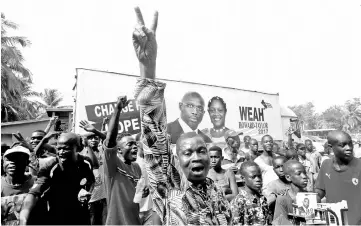  ?? — Reuters photo ?? Supporters of Weah, celebrate after the announceme­nt of the presidenti­al election results in Monrovia, Liberia.