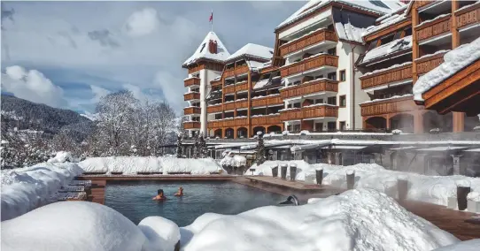  ??  ?? The Alpina Gstaad is the first luxury hotel built in the town for a century, with its traditiona­l façade disguising its overwhelmi­ng comfort