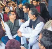  ?? HT PHOTO ?? Mminister Vishvendra Singh and IAS Neeraj K Pawan talk with Vijay Bainsla and K S Bainsla on railway tracks in Malarna Dunger station in Sawai Madhopur on Saturday.