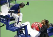  ?? ALEX PANTLING / GETTY IMAGES ?? Serena Williams argues with umpire Carlos Ramos during her match Saturday. “You stole a point from me,” she told him at one point. “You’re a thief.”