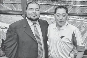  ?? REPUBLIC FILE PHOTO ?? Cardinals’ Spanish radio announcer Gabriel Trujillo (right) poses with broadcast partner Rolando Cantu. Trujillo brings excitement and energy to his play-by-play which is heard throughout the state in smaller Hispanic communitie­s as well as to fans in...