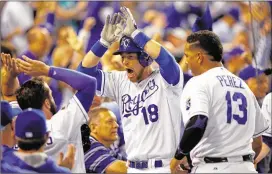  ?? GETTY IMAGES ?? Trade deadline pickup Ben Zobrist (above, celebratin­g his homer in Game 6 of the ALCS) stepped in for the injured Omar Infante and is hitting .326 in this postseason.