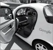  ?? ASSOCIATED PRESS ?? THIS MAY 18, 2016, file photo shows a Google self-driving car on display at Google’s I/O conference in Mountain View, Calif. Cars with no steering wheel, no pedals and nobody at all inside could be driving themselves on California roads by the end of...