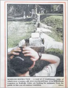  ?? SUBMITTED BY WENDY ELLIOTT ?? Wendy Elliott captured this image 20 years ago on June 10, 1997, when 21 headstones were also toppled at Wolfville’s Willowbank Cemetery.