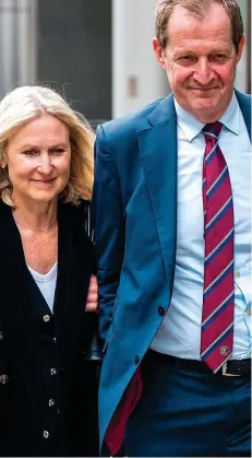  ?? ?? evidence: Alastair Campbell leaves the High Court with his partner fiona Millar yesterday
