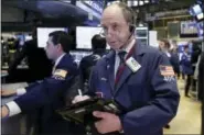  ?? RICHARD DREW — THE ASSOCIATED PRESS ?? Trader Gordon Charlop works on the floor of the New York Stock Exchange Wednesday.