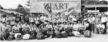  ??  ?? Heart of Borneo Highlands Eco Challenge II participan­ts pose for a group photo at Long Pa’ Sia’, Sabah, on July 21 before leaving on foot to Long Semadoh.