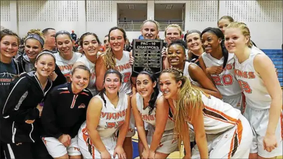  ?? BARRY TAGLIEBER — FOR DIGITAL FIRST MEDIA ?? Members of the Perkiomen Valley girls basketball team pose with the plaque after defeating Boyertown in the PAC-10Champion­ship on Wednesday night.