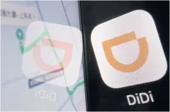  ?? REUTERS ?? The app logo of Chinese ride-hailing giant Didi is seen reflected on a navigation map displayed on a mobile phone.