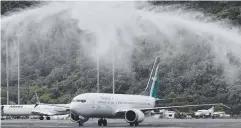  ??  ?? GROWTH: SilkAir’s Boeing 737 Max 8 welcomed at Cairns Airport.