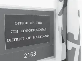  ?? JEFF BARKER/BALTIMORE SUN MEDIA GROUP ?? Since the death of Rep. Elijah Cummings, a sign that bore his name has been changed to reflect the vacant office.