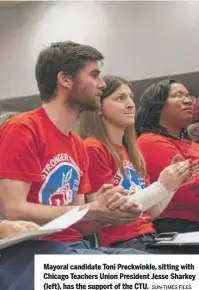  ?? SUN-TIMES FILES ?? Mayoral candidate Toni Preckwinkl­e, sitting with Chicago Teachers Union President Jesse Sharkey (left), has the support of the CTU.