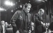  ?? J. Scott Applewhite / Associated Press ?? Border Patrol acting Chief Carla Provost and Immigratio­n and Customs Enforcemen­t official Matthew Albence prepare to testify as the Senate Judiciary Committee on Tuesday. They spoke about the failures of the migrant family separation policy.