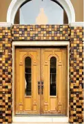  ??  ?? WOOD WELCOME Four Legged Tiles created this exterior wall cladding for a mansion's entryway