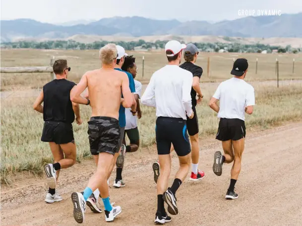  ??  ?? ↑ Tinman Elite members on a training run
↖ Sam Parsons wrapping up a meeting with Coach Schwartz
← Looking after each other is part of the Tinman Elite ethos