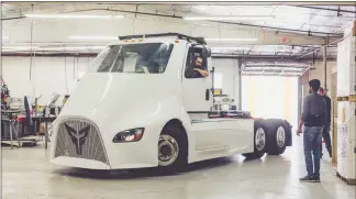  ??  ?? A Thor Trucks electric semi is tested May 15 in Los Angeles. Low-speed torque and whisper-quiet operation make electric vehicles an attractive alternativ­e for commercial uses.