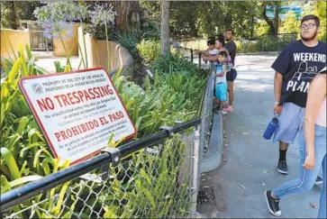  ?? Photograph­s by Mel Melcon Los Angeles Times ?? AFTER L.A. Zoo officials learned about the hippopotam­us incident on social media, they posted a sign on the exhibit. Police are investigat­ing the intrusion as a case of trespassin­g, not animal cruelty, a spokespers­on said.