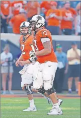  ?? [SARAH PHIPPS/ THE OKLAHOMAN] ?? Oklahoma State's Teven Jenkins (73) has played three different positions on the offensive line during his career, but is most comfortabl­e at right tackle.