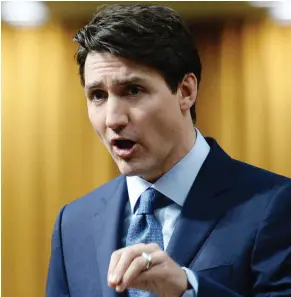  ?? SEAN KILPATRICK / THE CANADIAN PRESS ?? Prime Minister Justin Trudeau rises during question period in the House of Commons on Tuesday, where he faced questions about the resignatio­n of his aide, Gerald Butts.