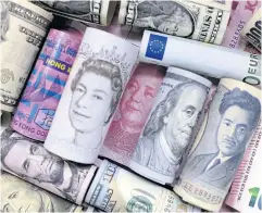  ?? REUTERS ?? Euro, Hong Kong dollar, US dollar, Japanese yen, pound and Chinese yuan banknotes are seen in a photo illustrati­on.