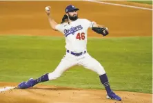  ?? Tony Gutierrez / Associated Press ?? Dodgers rookie righthande­r Tony Gonsolin, who went to St. Mary’s, started Game 2 of the World Series on Wednesday.