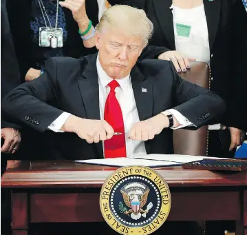  ?? PABLO MARTINEZ MONSIVAIS / THE ASSOCIATED PRESS FILES ?? U.S. President Donald Trump is nearing his first 100 days in office without any major legislativ­e victories. Even his significan­t executive orders, such as issuing a travel ban and pressuring sanctuary cities, are stuck in the courts.