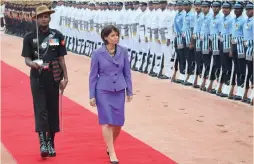  ?? — SONDEEP SHANKAR ?? Swiss President Doris Leuthard inspects the guard of honour during the welcome ceremony at Rashtrapat­i Bhavan in New Delhi on Thursday.