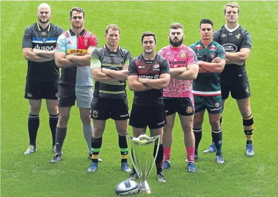  ?? Getty. ?? From left, Matt Garvey of Bath Rugby, James Horwill, Harlequins, Dylan Hartley, Northampto­n Saints, Brad Barritt, Saracens, Luke Cowan-Dickie, Exeter Chiefs, Matt Toomua, Leicester Tigers and Joe Launchbury of Wasps pose with the Champions Cup trophy.