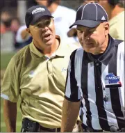  ?? File-LARRY GREESON / For the Calhoun Times ?? Calhoun head coach Hal Lamb (left) talks to an official during a game in 2015.