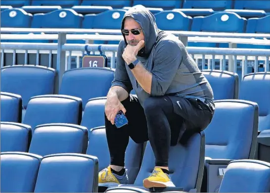  ?? GENE J. PUSKAR/AP ?? Pirates manager Derek Shelton watches a simulated game from the seats behind home plate during a workout Wednesday on the field at PNC Park in Pittsburgh.