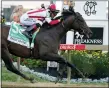  ?? JULIO CORTEZ — THE ASSOCIATED PRESS ?? Jose Ortiz atop Early Voting wins the 147th running of the Preakness Stakes at Pimlico Race Course on Saturday in Baltimore.