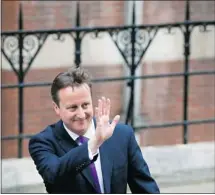  ?? Dennis Adrian, Afp-getty Images ?? British Prime Minister David Cameron leaves the High Court in London on Thursday after giving evidence at the Leveson inquiry.