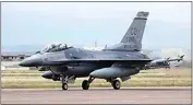  ?? DAVID ZALUBOWSKI / AP, FILE ?? A F-16 Fighting Falcon from Colorado Air National Guard’s 140th Wing takes off from Buckley Air Force Base as part of a second flyover to salute COVID-19 front-line workers May 15, 2020, in Aurora, Colo.