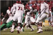  ?? AP PHOTO ?? Louisville quarterbac­k Lamar Jackson (8) is brought down during the first half.