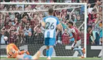  ?? (AFP) ?? Aston Villa’s English striker Ollie Watkins (R) celebrates after scoring their second goal during the English Premier League match against Brighton and Hove Albion at Villa Park in Birmingham on Sunday.